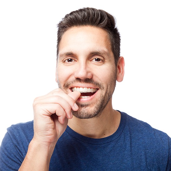 Man placing Invisalign tray