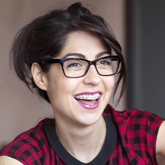 Smiling woman with metal braces