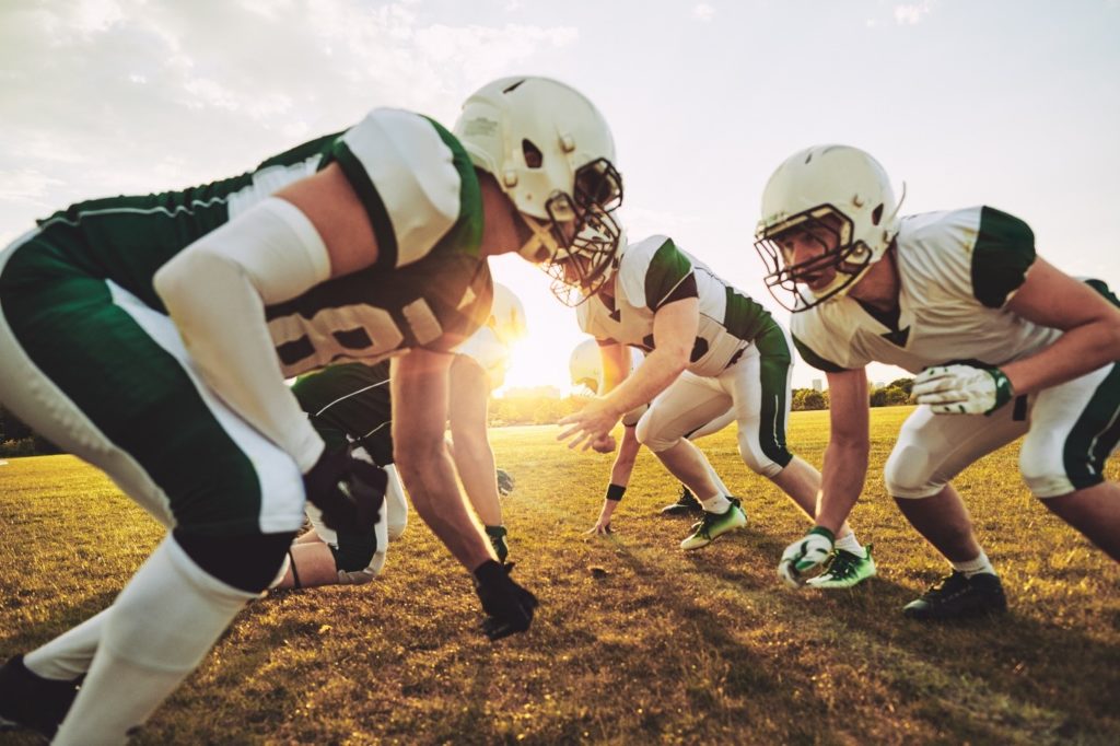 Group of kids playing football